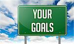 Highway Signpost with Your Goals wording on Sky Background.