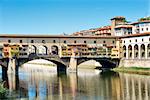 Image of Ponte Vecchio and river Arno in Florence, Italy in autumn on a sunny day