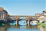 Image of Ponte Vecchio and river Arno in Florence, Italy in autumn on a sunny day