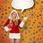 Pretty girl in santa outfit holding gift against yellow vignette