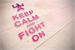 Breast cancer awareness message against bleached wooden planks background