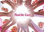 Happy women in circle wearing pink for breast cancer on white background