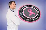 Doctor with breast cancer awareness message for awareness month