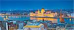 Panoramic image of Budapest, capital city of Hungary, during twilight blue hour.