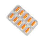 top of view of orange pills packed in blister isolated on white background
