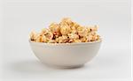 popcorn with caramel isolated on a white background