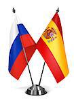 Spain and Russia - Miniature Flags Isolated on White Background.