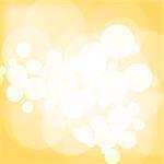 Abstract yellow bokeh christmas background with sparkles