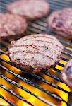 Burgers on grill, close-up