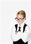 Girl dressed as businesswoman, studio shot