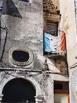 Italian flag on balcony, low angle view