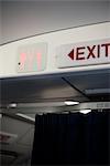 Exit sign and toilet sign in airplane