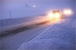 Cars on country road at winter