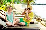 Smiling young couple at beach