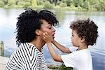 Mother with son playing together