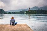 Woman looking at view, Lake Bled, Julian Alps, Gorenjska, Slovenia, Europe