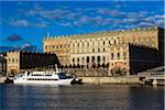 Ferry in front of The Royal Palace, Gamla Stan (Old Town), Stockholm, Sweden