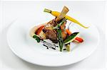 Caramelized shank of lamb with celery and coffee puree, vegetables and red wine sauce