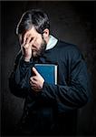 Priest with Prayer book