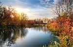 Autumn season on the calm river at sunrise