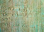 Blue and Beige Damaged Obsolete Textured Cement Wall Background closeup