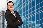 Confident Attractive Mixed Race Woman in Front of Corporate Building Outside.