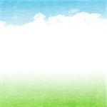 Grunge abstract summer background with blue sky and green field