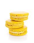 Yellow macaron cookies. Isolated on white background