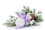 Christmas bauble with purple ribbon and fir tree. Isolated on white background