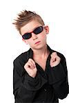 Cool trendy fashionable boy dressed in black dress shirt and sunglasses isolated on white background.