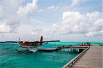 Sea plane docked at the arrival pier, Maldives.