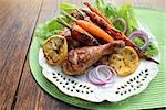 Grilled chicken legs and carrots