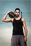 Portrait of young man street basket player