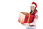 Girl standing while holding a present on white background