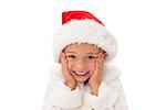 Cute little girl wearing santa hat  on white background