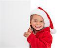 Festive little girl showing poster on white background