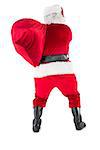 Rear view of santa holding a sack on white background