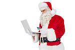 Santa claus shopping online with laptop on white background