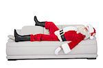 Santa claus sleeping on the couch on white background