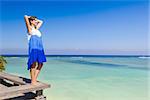 Beautiful woman relaxing on a beautiful tropical beach