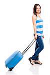Beautiful young woman carrying her luggage ready for travel, isolated over white background