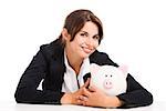 Beautiful hispanic business woman holding a piggy bank, isolated over white background