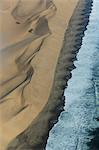 Aerial view of coastline and dunes, Namib Desert, Namibia