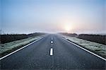 Empty road in rural setting, Northamptonshire, England