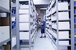 Worker checking stocks at healthcare warehouse