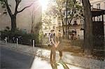 Young couple face to face on suburban street