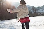 Woman running in snow