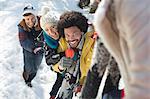 Friends playing in snow