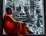 Cambodia, Siem Reap, Angkor Wat complex. Monks inside Bayon temple (MR)