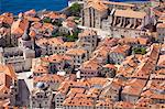 Europe, Croatia, Dalmatia, Dubrovnik, elevated view of the historic centre of town  - the Old City of Dubrovnik Unesco World Heritage site - showing the Church of St. Blaise (Crkva Svetog Vlaha) and Cathedral of the Assumption of the Virgin Mary and fortified walls